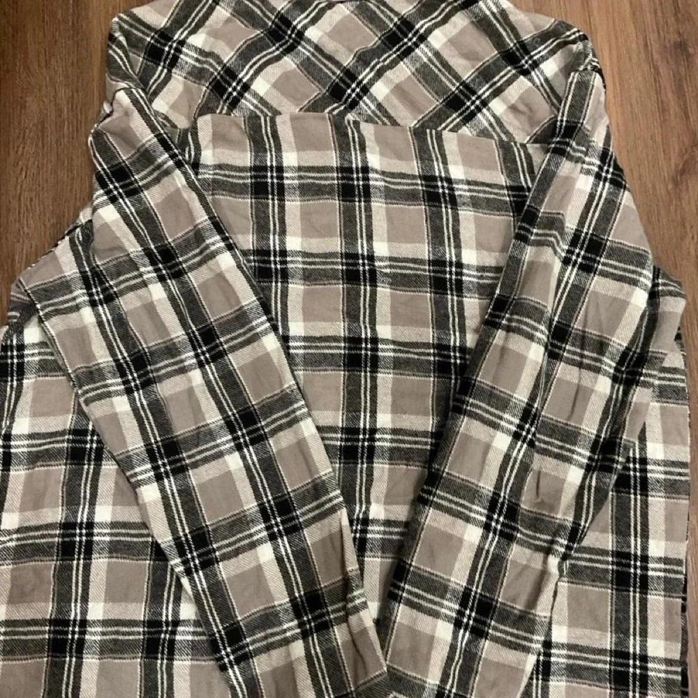 Little Bipsy black, white, and gray plaid button-up shirt